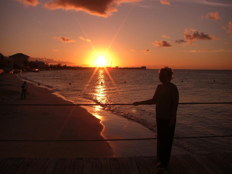 CIMG0064.JPG - Marsha is enjoying the sunset and champagne