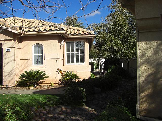 CIMG0174.JPG - The front door is down this side